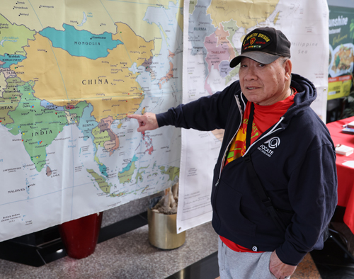 Pointing to map of China