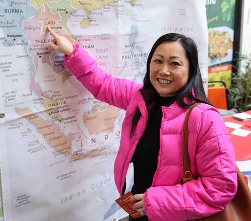 Pointing to map of Laos