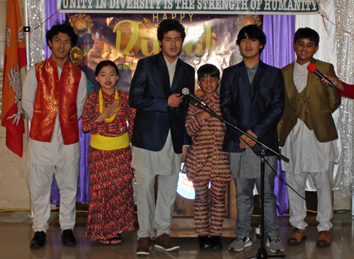 Bhutanese and Nepali youth led the singing of the US national anthem