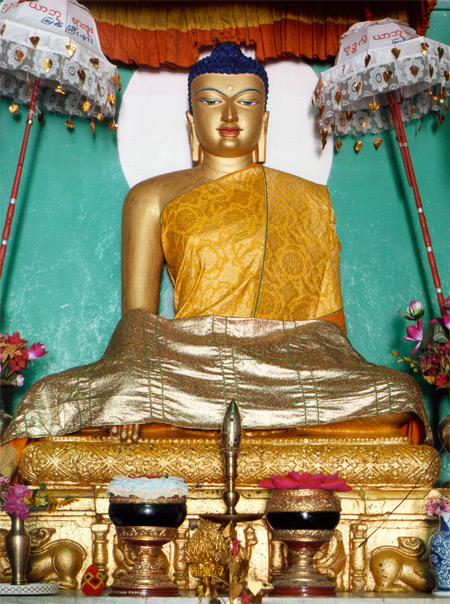 Main image of Sakyamuni Buddha within the Mahabodhi Temple at Bodhgaya, Bihar, India photo by Christopher Fynn