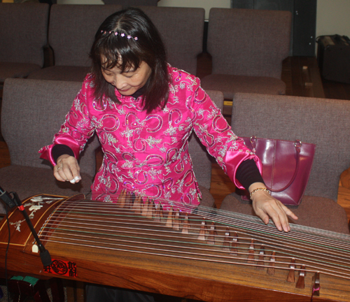 Rosa Lee playing the guzheng