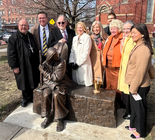 Group at the Blessing the Be Welcoming statue at St Augustine Church in Tremont Cleveland