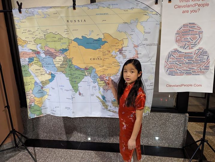 Elizabeth Mary Marok pointing to map of China
