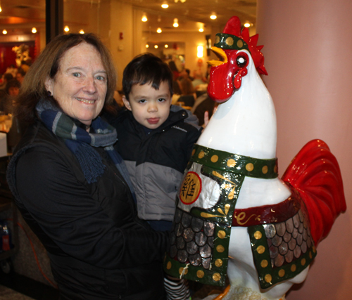 Lady with son and Chinese Rooster Zodiac