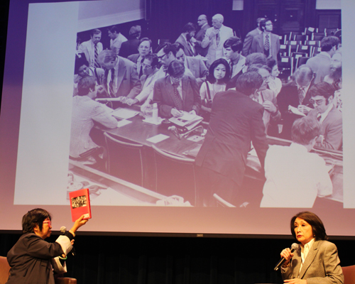 Connie Chung in a group of men