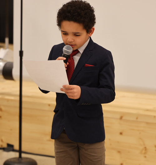 Young man announcing the acts