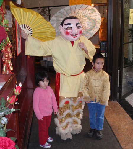 Chinese clown with children celebrating new year
