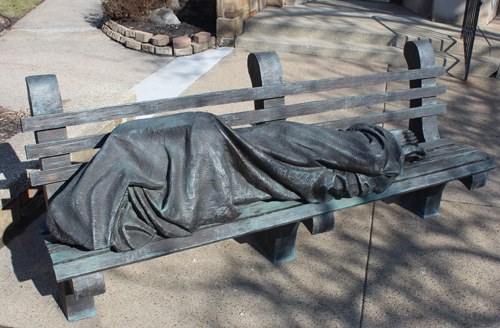 Homeless Jesus figure from Matthew 25 Collection at St Malachi Church in Cleveland