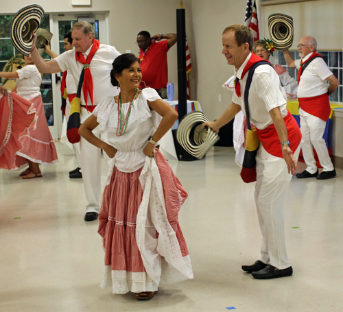 Dancers performing the national dance of Colombia, Cumbia
