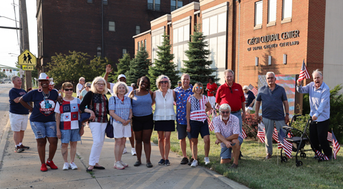 Group placing US flags at Czech Cultural Center