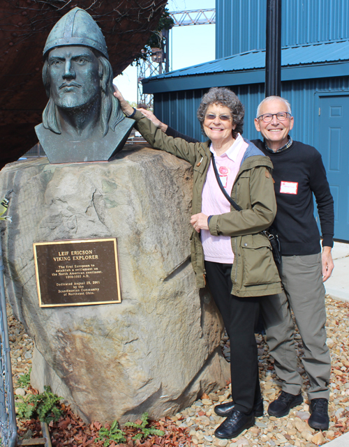 Denmark couple Posing with the bust of Leif Erikson on Leif Erikson Day in Cleveland 2025