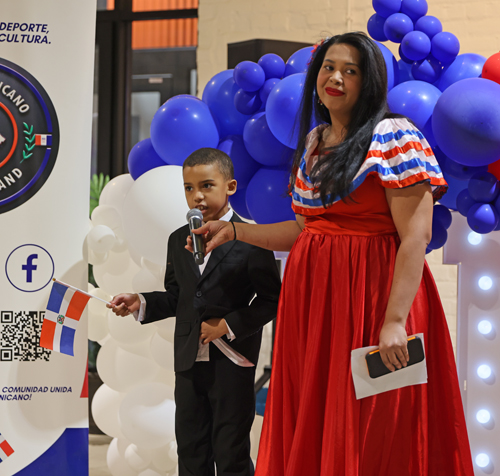 Maestra de Ceremonias Lianny Peguero and boy