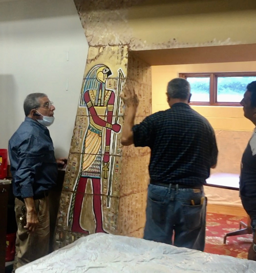 Architect Sahar Makar and helpers working on the Egyptian entrance gate