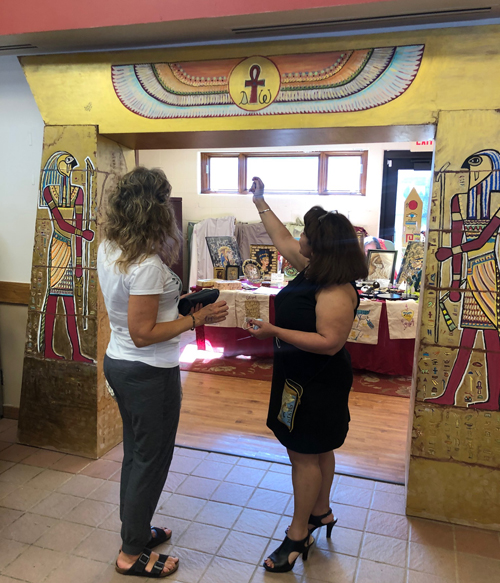 Architect Sahar Makar and helpers working on the Egyptian entrance gate