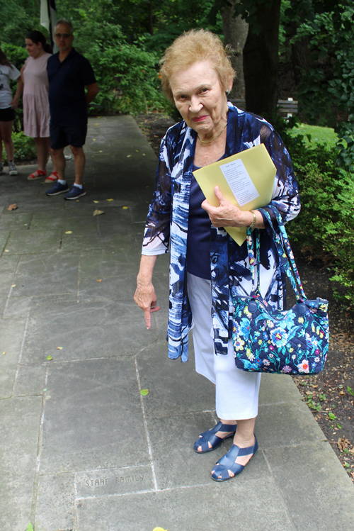 Lia Staaf shows the Staaf Family brick