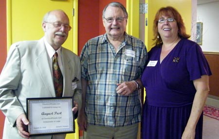 Ambassador at Large August Pust, Wallace Huskonen and Debbie Hanson 