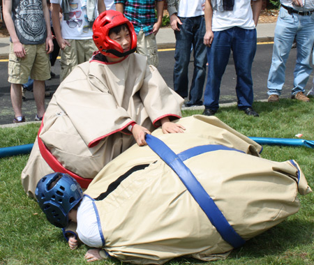 Sumo wrestlers in fat suit at Cleveland Asian festival