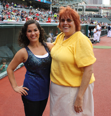 Debbie Hanson and national anthem singer Eleni Nikolakis