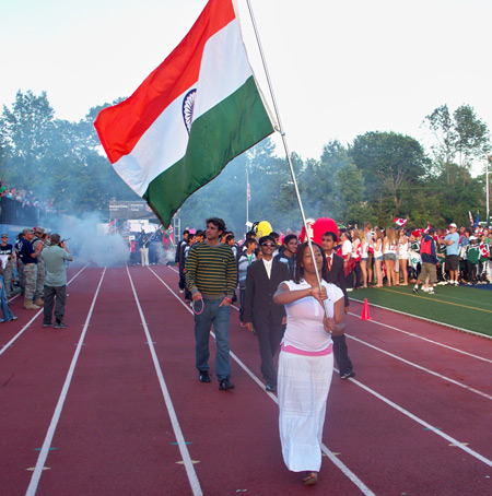 Indian athletes march into Don Shula Stadium