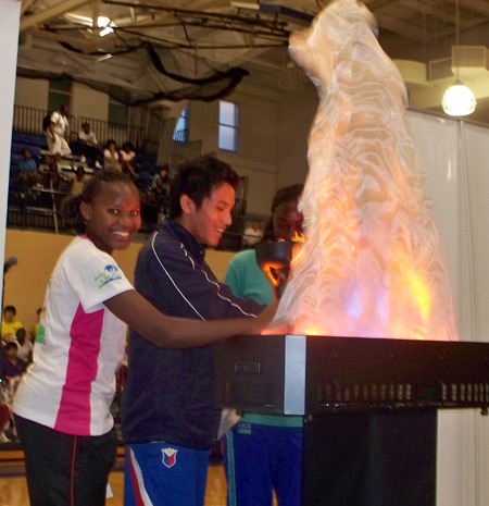 Lighting the torch to begin the 2010 World School Games at John Carroll University