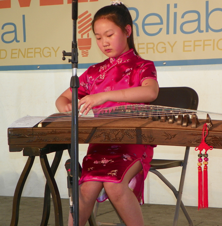 5th-grader Angela Wang plays the Guzheng, a traditional a Chinese plucked zither, at the 2011 Cleveland Asian Festival