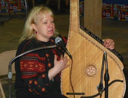 Irene Zawadiwsky playing the Ukrainian Bandura