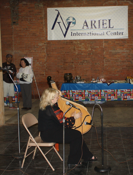 Irene Zawadiwsky playing the Ukrainian Bandura