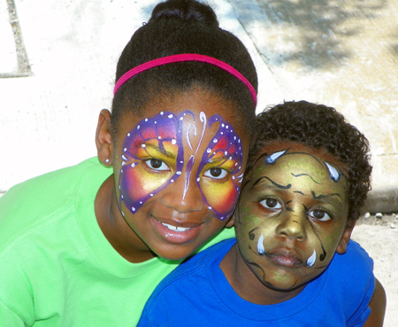 Girl and boy with faces painted