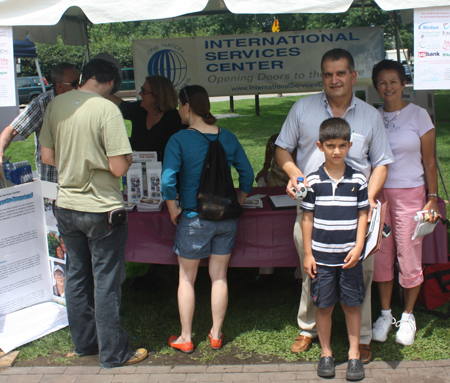 International Services Center Board Members George Koussa (and son) and Dora Harper 