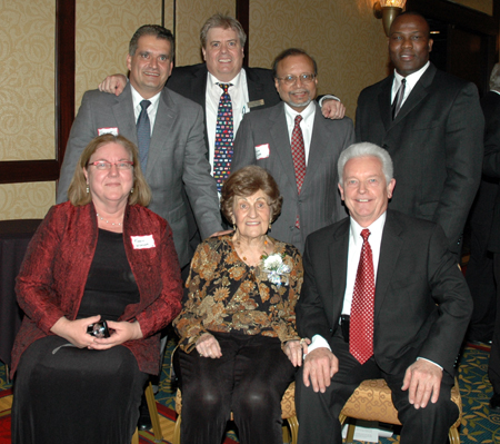 Lucretia Stoica with International Services Center board members