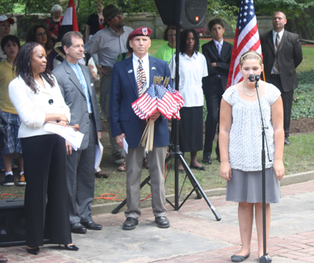 7th grader Molly Webster of Hawken School sang America the Beautiful 