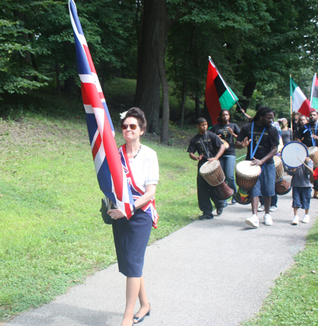 Mary Hamlin carries the UK Flag