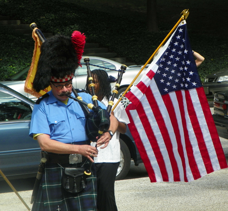 Piper Donald Willis led the Parade of Flags