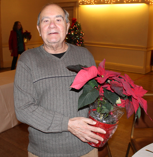 Winner of a poinsetta plant