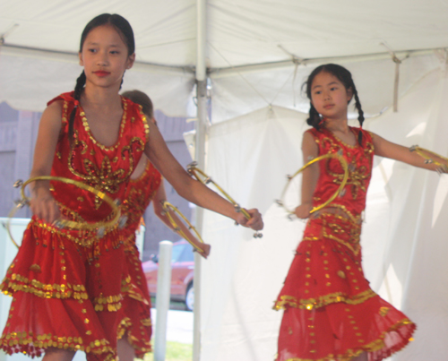 Young girls from the Westlake Chinese School perform a Golden Rings dance at the 2012 Asian Festival in Cleveland