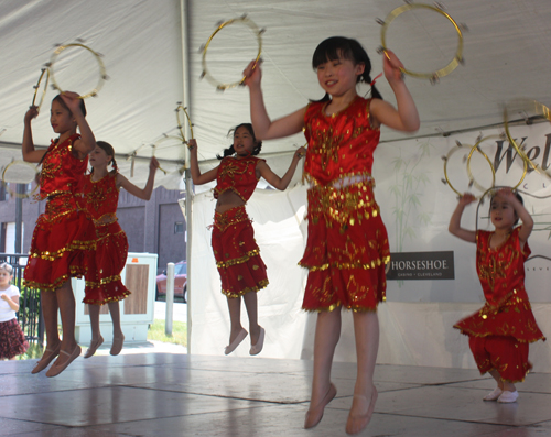 Young girls from the Westlake Chinese School perform a Golden Rings dance at the 2012 Asian Festival in Cleveland