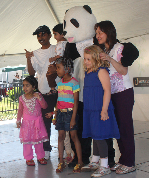 Posing with CAF, the Panda Mascot