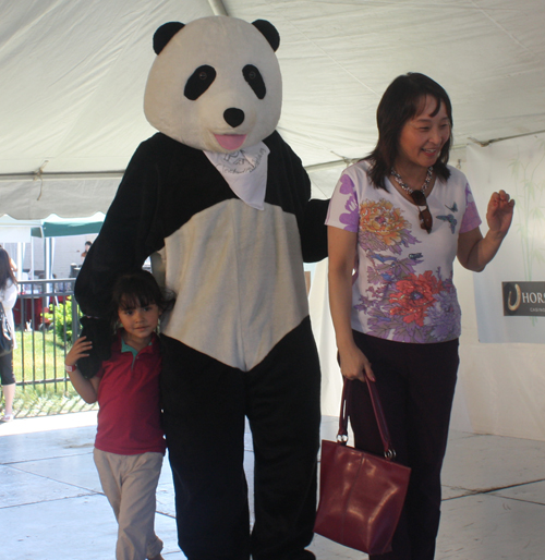 Posing with CAF, the Panda Mascot