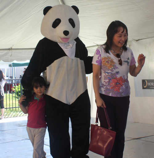 Posing with CAF, the Panda Mascot