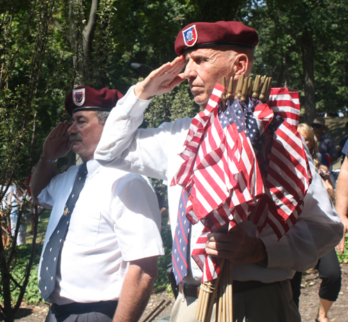 Jim Quisenberry and Ray Saikus salute the flag