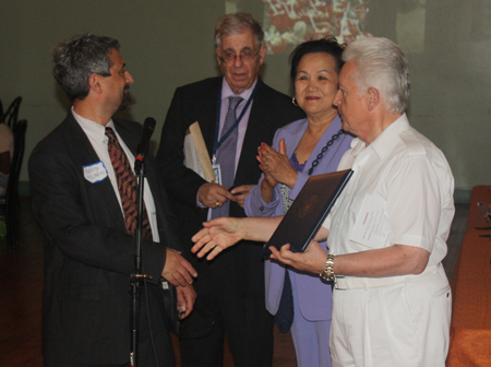 >Marty Gelfand, representative of Congressman Dennis Kucinich with Joe Meissner, Gia Hoa Ryan and Ken Kovach