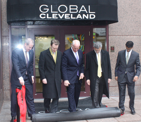 Rolling out carpet at the Global Cleveland Welcome Center