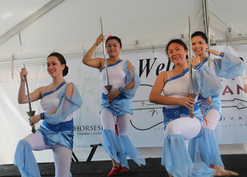 Yin Tang and students from the Ariel International Music Academy performed a traditional Chinese sword dance