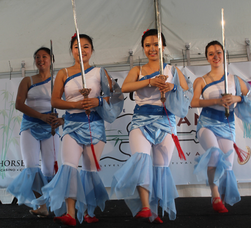 Yin Tang and students from the Ariel International Music Academy performed a traditional Chinese sword dance 