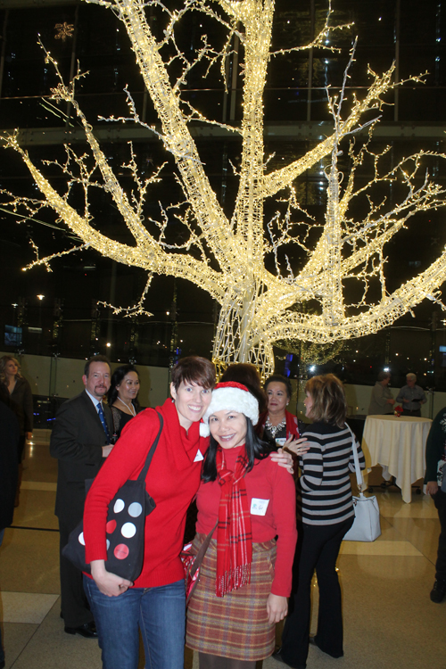 Posing by the holiday tree