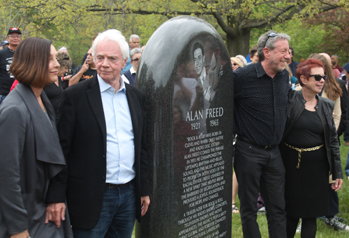 Alan Freed family with monument to their father