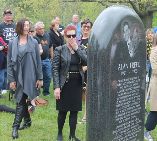 Alan Freed family with monument to their father