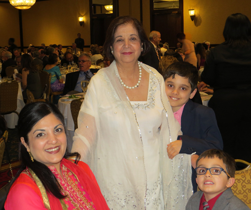 Inductee Mona Alag with daughter and grandsons