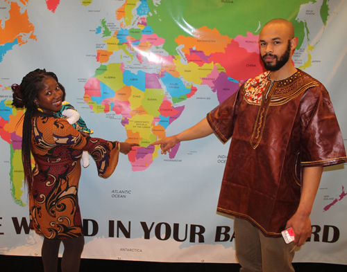 Posing with a map of Zambia