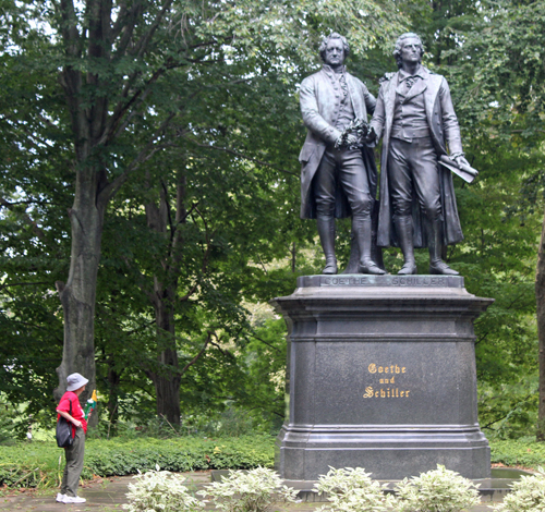 Woman looking at Goethe-Schiller monument in Cleveland